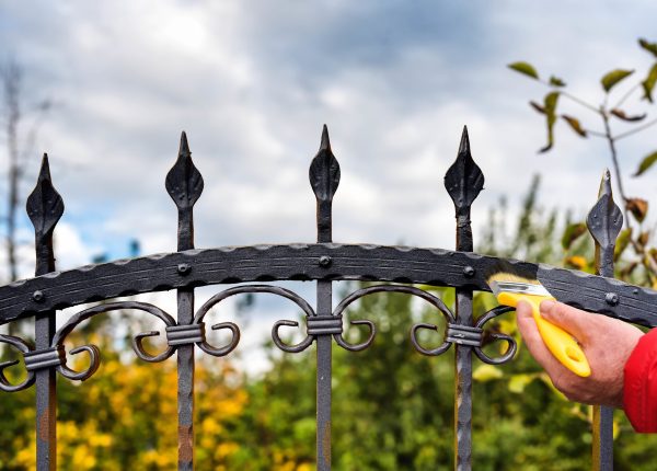 Hand,With,Brush,Painting,Wrought,Iron,Fence